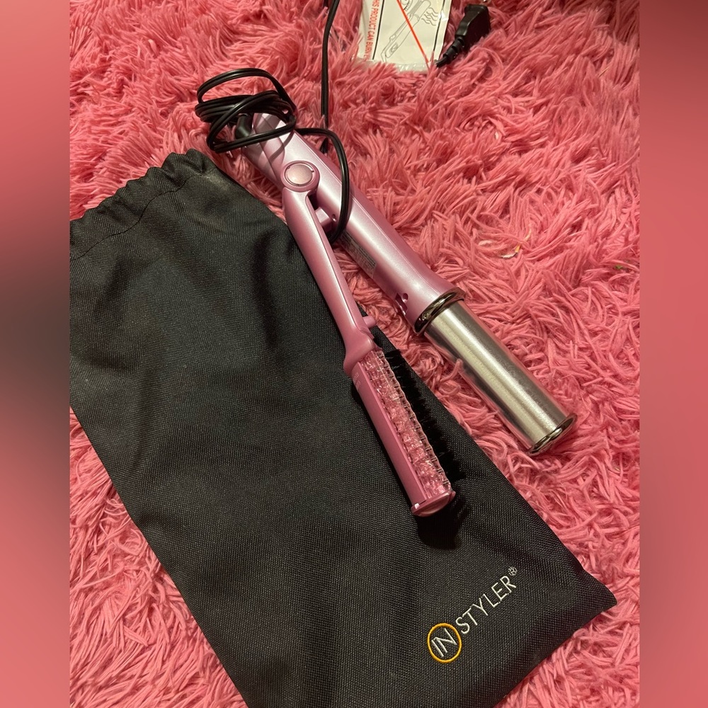 beautiful coral multi use curler and straightener 🪮